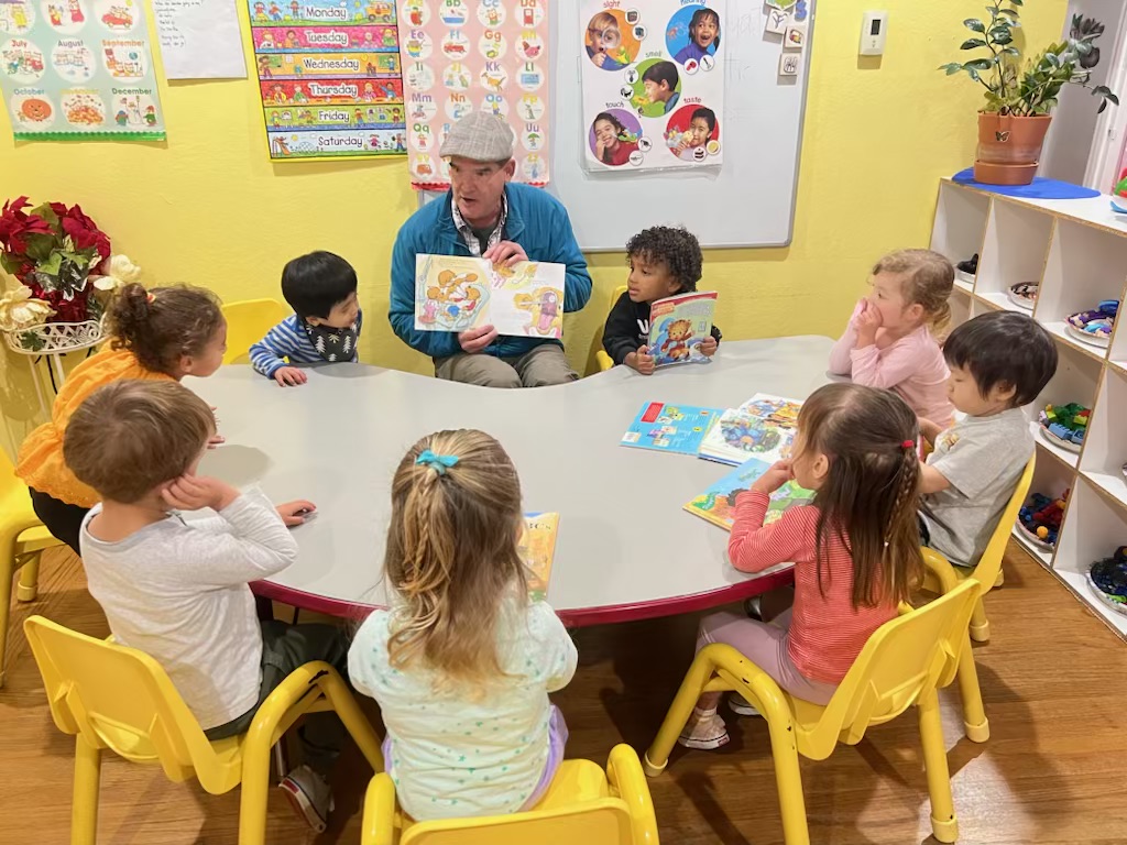Infants playing and bonding with caregivers